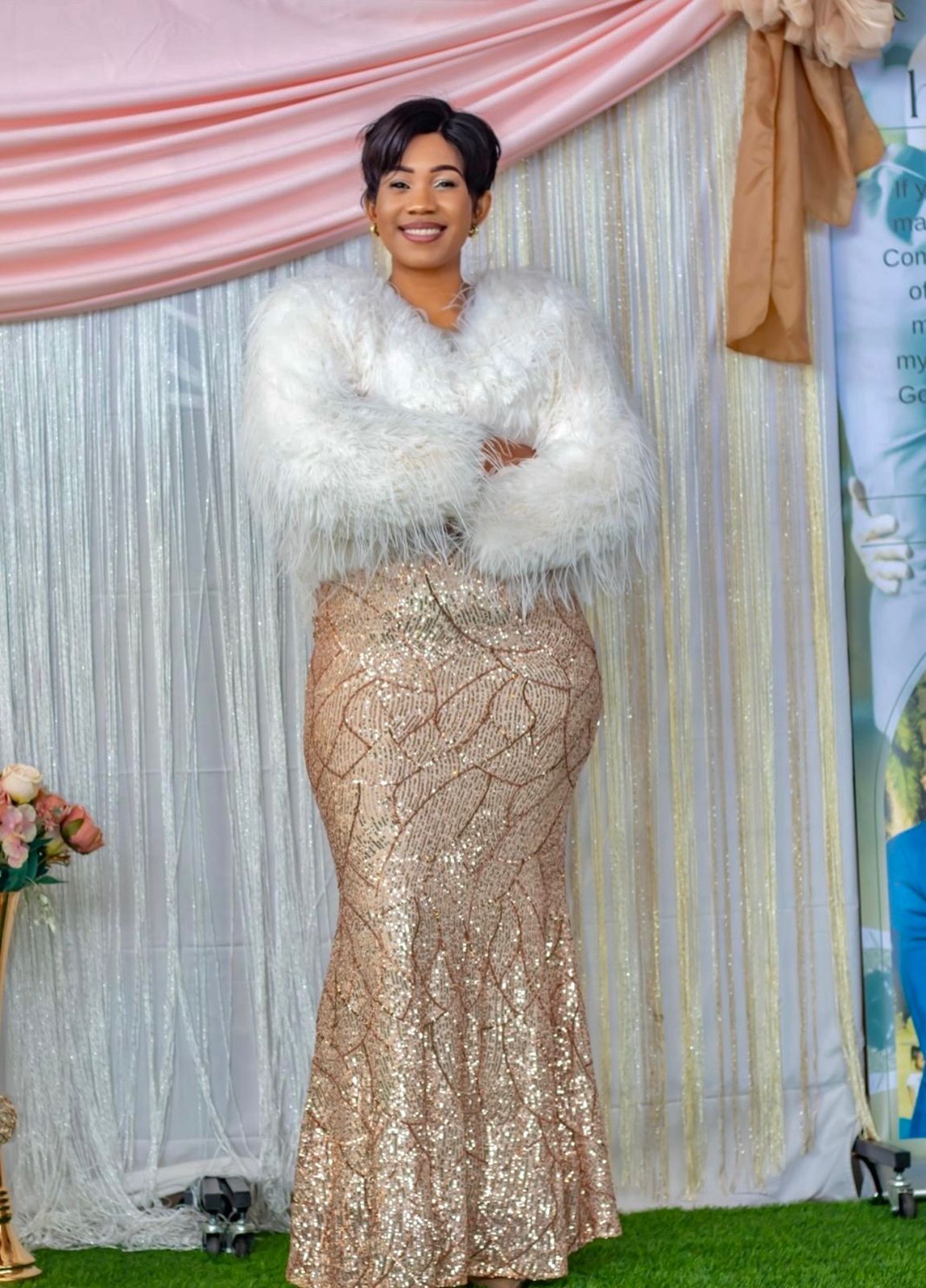 Woman smiling at a ministry celebration